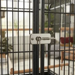 Secure bird-proof door latch on a large metal parrot cage ensuring pet safety and security.