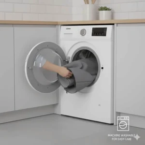 Illustration of a bird cage cover being placed in a washing machine, highlighting easy maintenance.