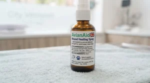 Macro shot of a first-aid spray bottle label highlighting non-toxic, alcohol-free, and avian-safe active ingredients.